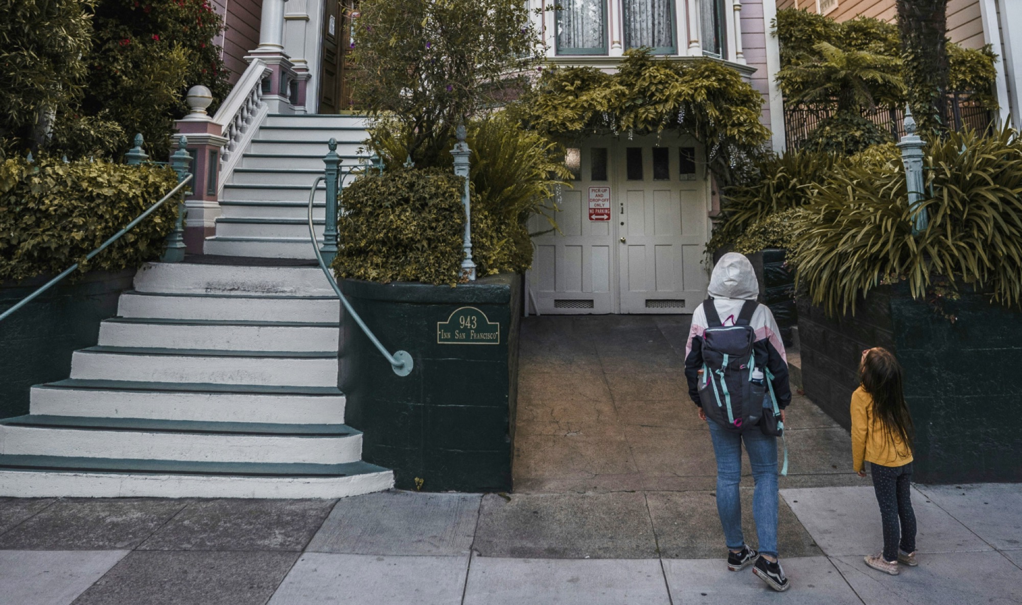 San Franciscans in front of a home